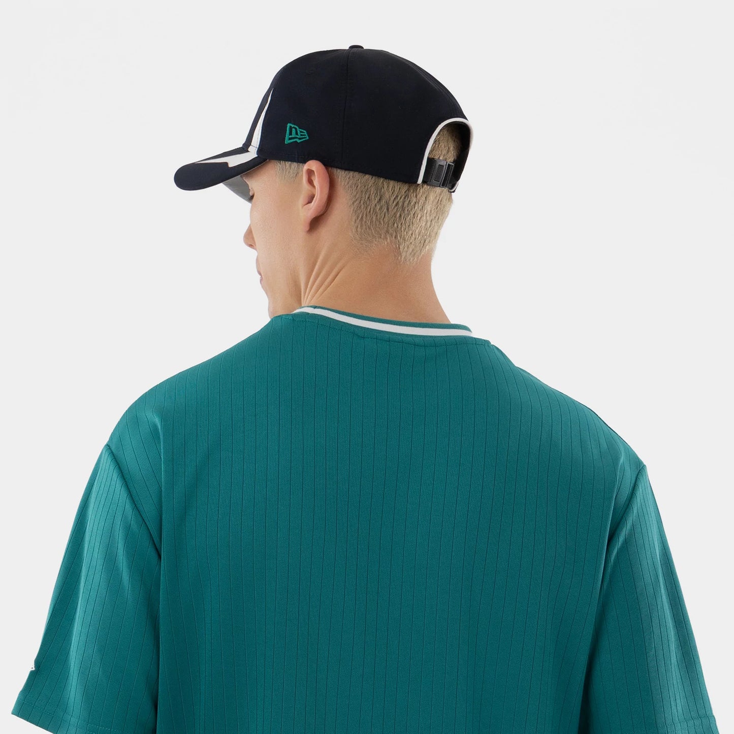 The model is wearing this MLB Seattle Mariners Oversized T-Shirt in green. 7