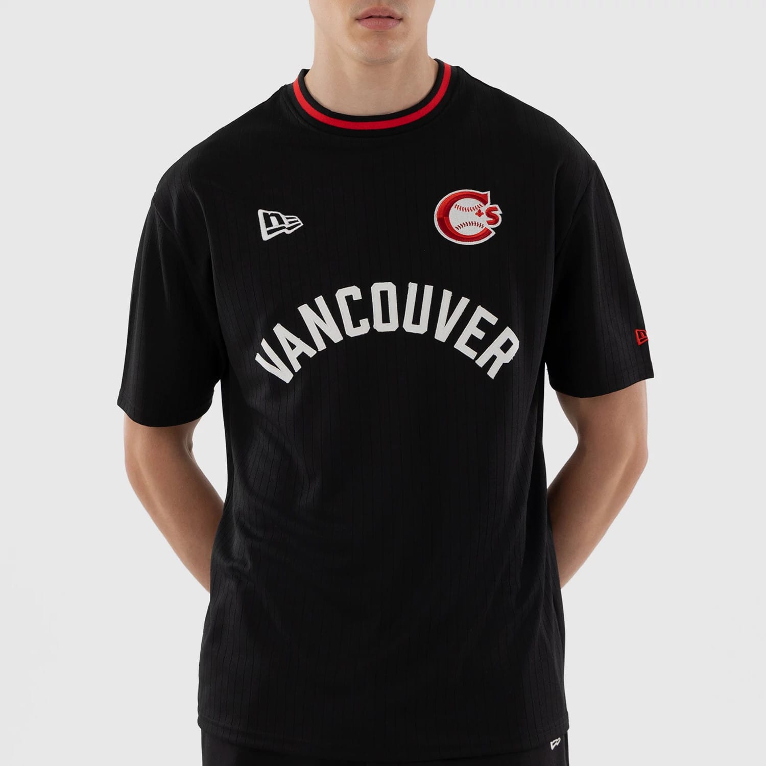 The model is wearing this MiLB Vancouver Canadians Oversized T-Shirt in black. 3