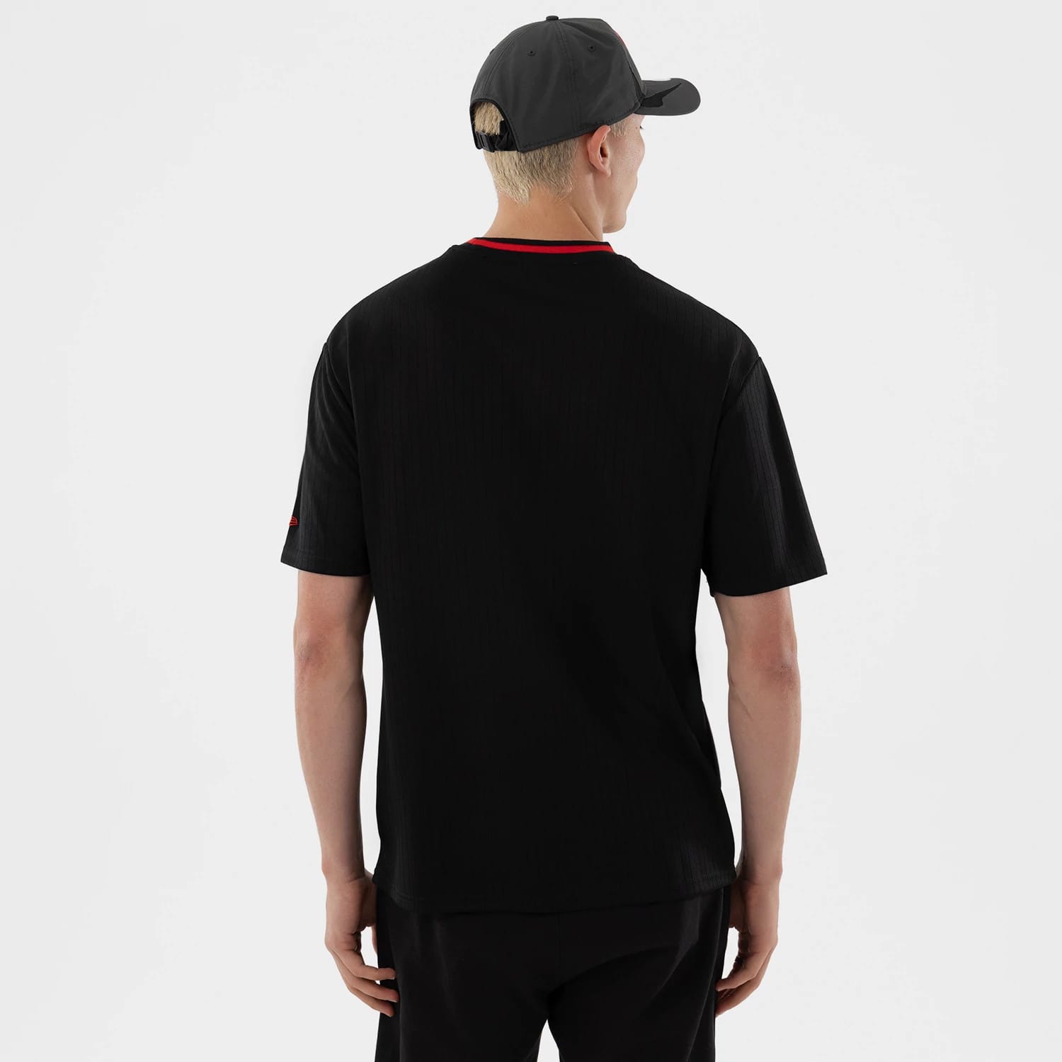 The model is wearing this MiLB Vancouver Canadians Oversized T-Shirt in black. 2