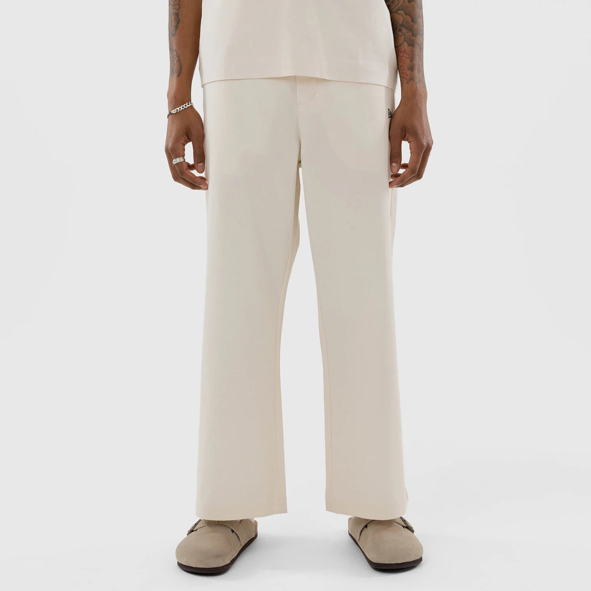 The model is wearing this MLB New York Yankees Chino Trousers in Cream. 1