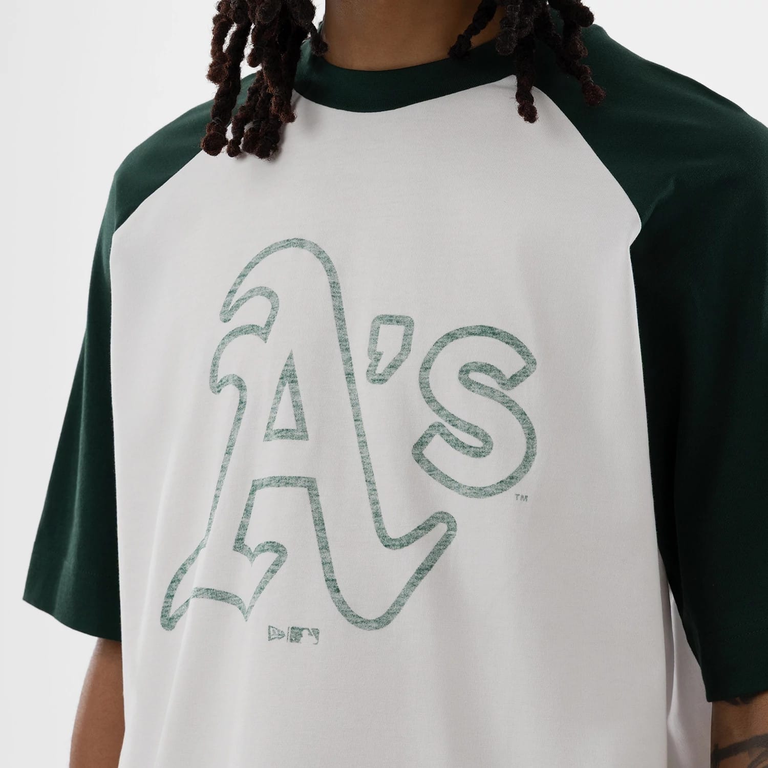 The model is wearing this MLB Athletics Boxy T-Shirt in white. 3