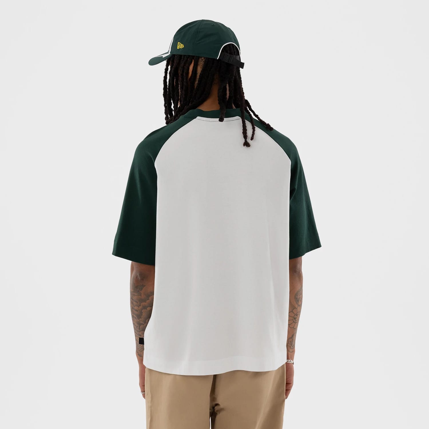 The model is wearing this MLB Athletics Boxy T-Shirt in white. 2
