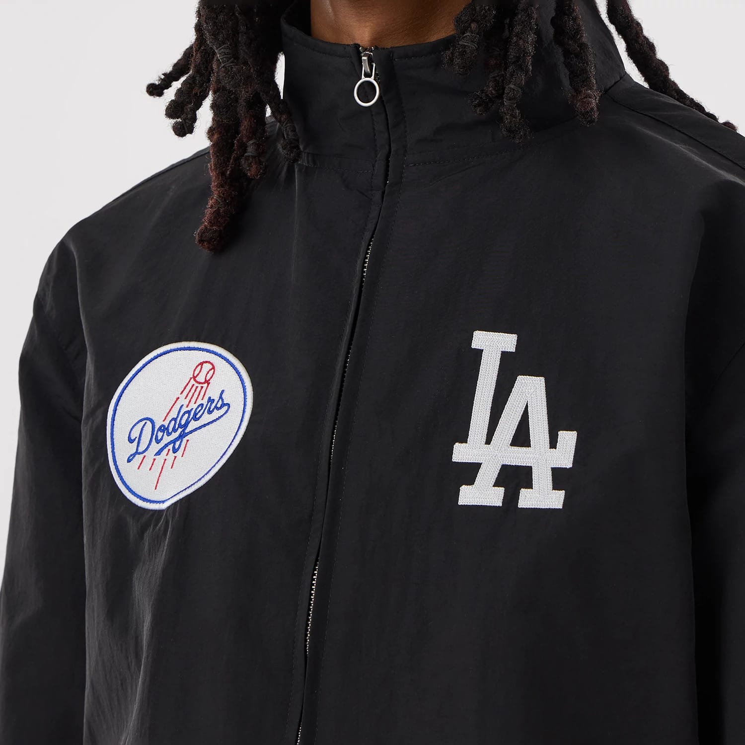 The model is wearing this MLB LA Dodgers Sports Jacket in black. 4