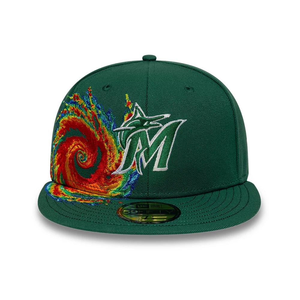 Pictured is this MLB Storm Pattern Miami Marlins 59FIFTY Fitted cap in Dark Green. 2