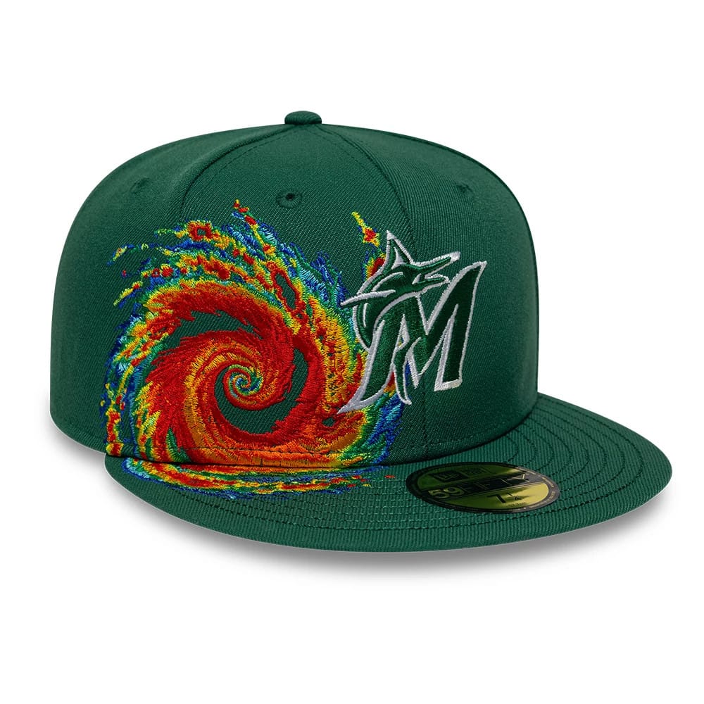 Pictured is this MLB Storm Pattern Miami Marlins 59FIFTY Fitted cap in Dark Green. 1