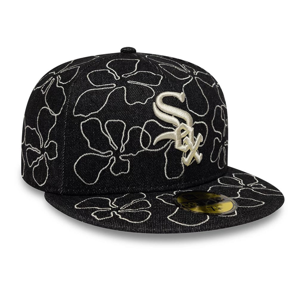 Chicago White Sox MLB Floral Denim Black New Era 59FIFTY Fitted Cap, front view showing the raised white embroidered Sox logo on the front panel, with large white floral patterns across the black denim fabric.