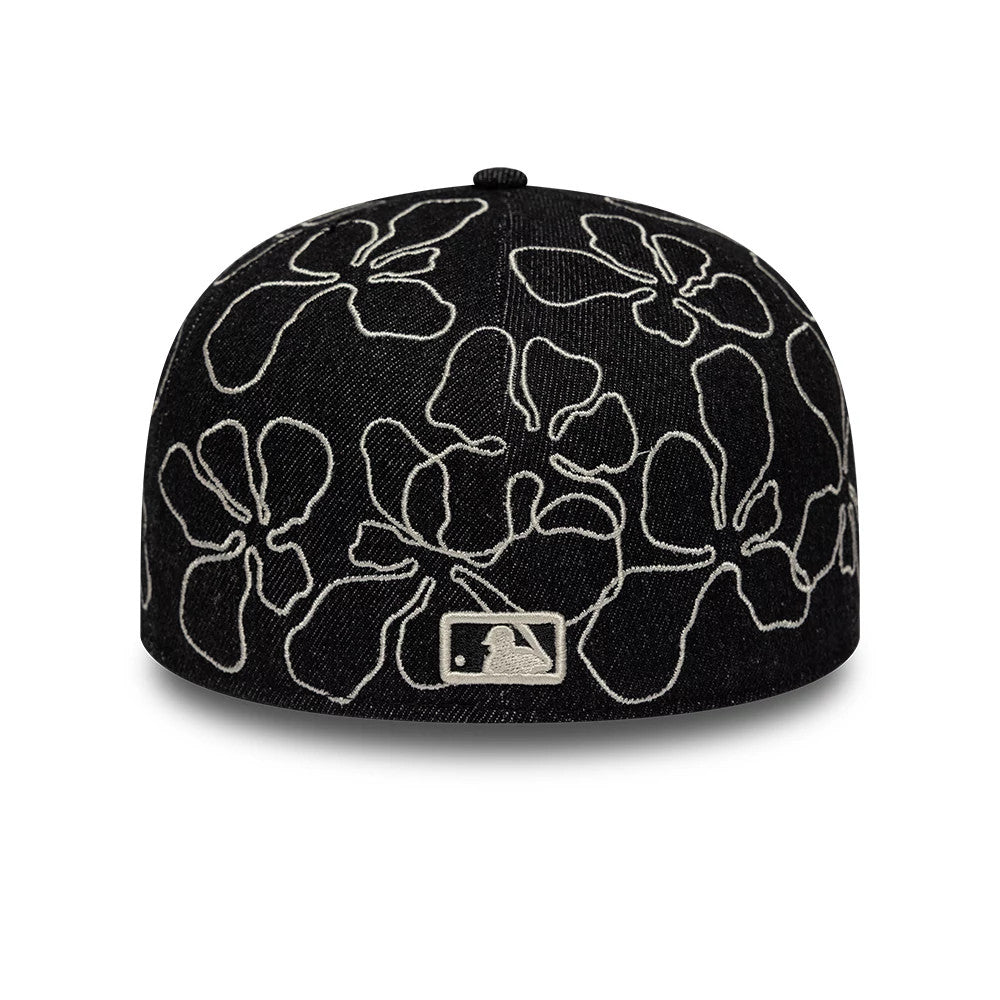 New York Yankees MLB Floral Denim Black New Era 59FIFTY Fitted Cap, rear view showing the white embroidered MLB Batterman logo at the centre of the back panels, with a prominent floral pattern in white threading over the black denim fabric.