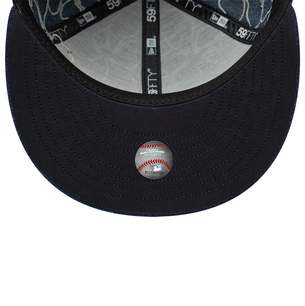 LA Dodgers MLB Floral Denim Blue New Era 59FIFTY Fitted Cap, inside view showing black taping with 59FIFTY branding, a black sweatband, a dark undervisor, and a baseball-shaped holographic sticker placed at the centre.