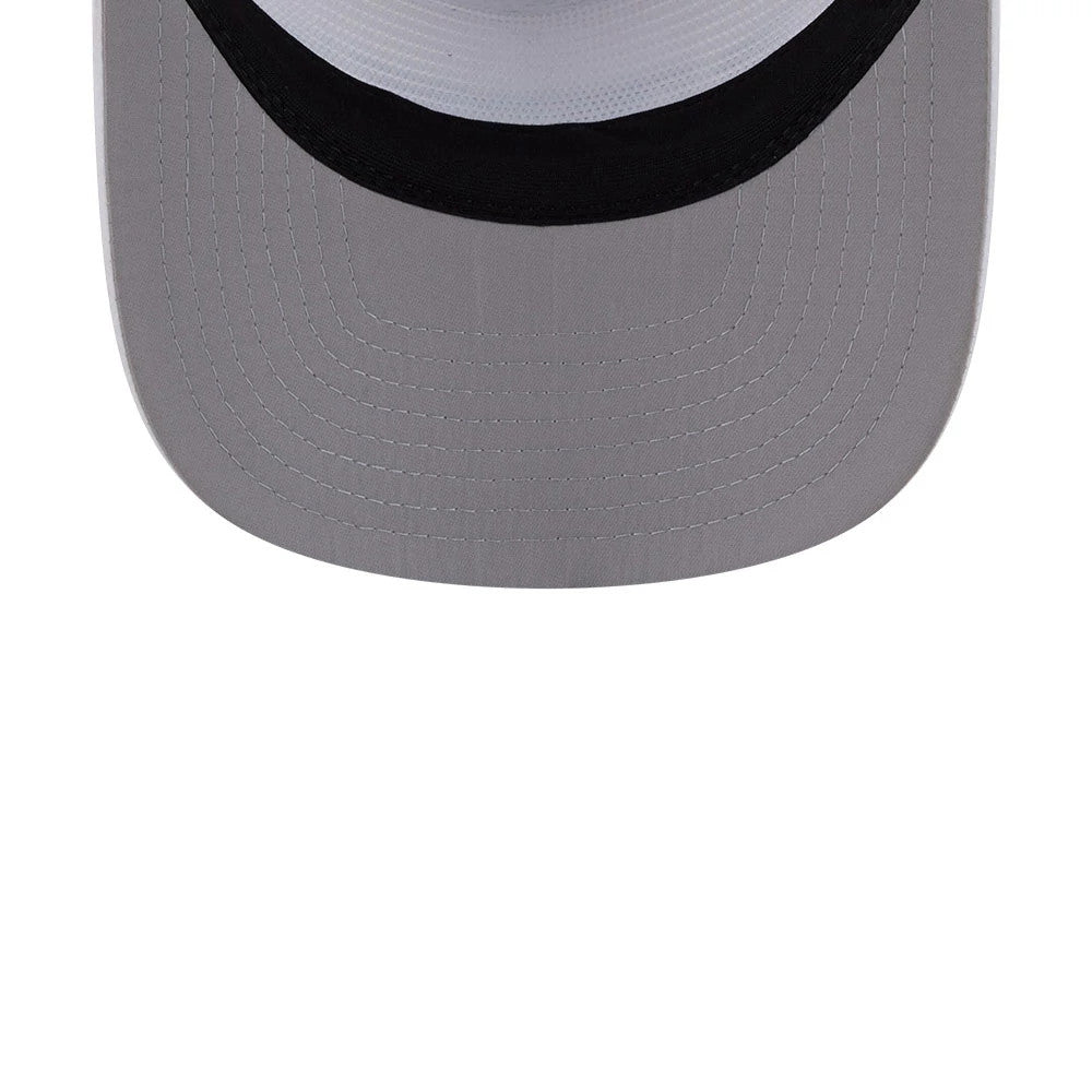 New Era Golf White 19TWENTY Adjustable Cap, top view showing the light grey visor with stitching, contrasting black edge beneath the white crown, and the classic curved shape of the visor.