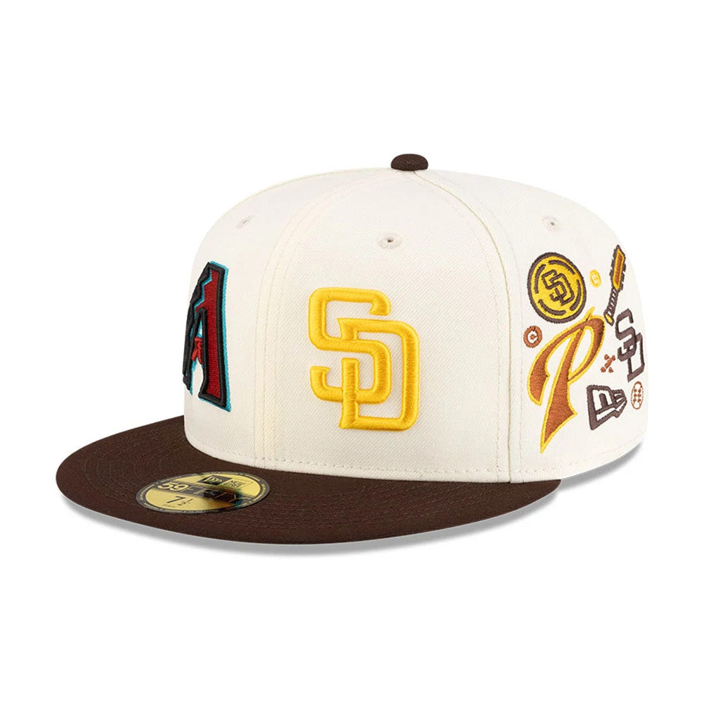 All Over MLB Mexico City Series 2026 White New Era 59FIFTY Fitted Cap, three-quarter view showing diverse embroidered team logos including the yellow SD on the front panel, with a brown flat visor and a gold 59FIFTY size sticker.