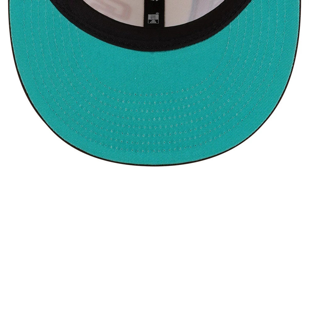All Over MLB Mexico City Series 2026 White New Era 59FIFTY Fitted Cap, inside view showing the teal undervisor, black sweatband contrasting with the structure of the cap and New Era branded taping along the interior panels.