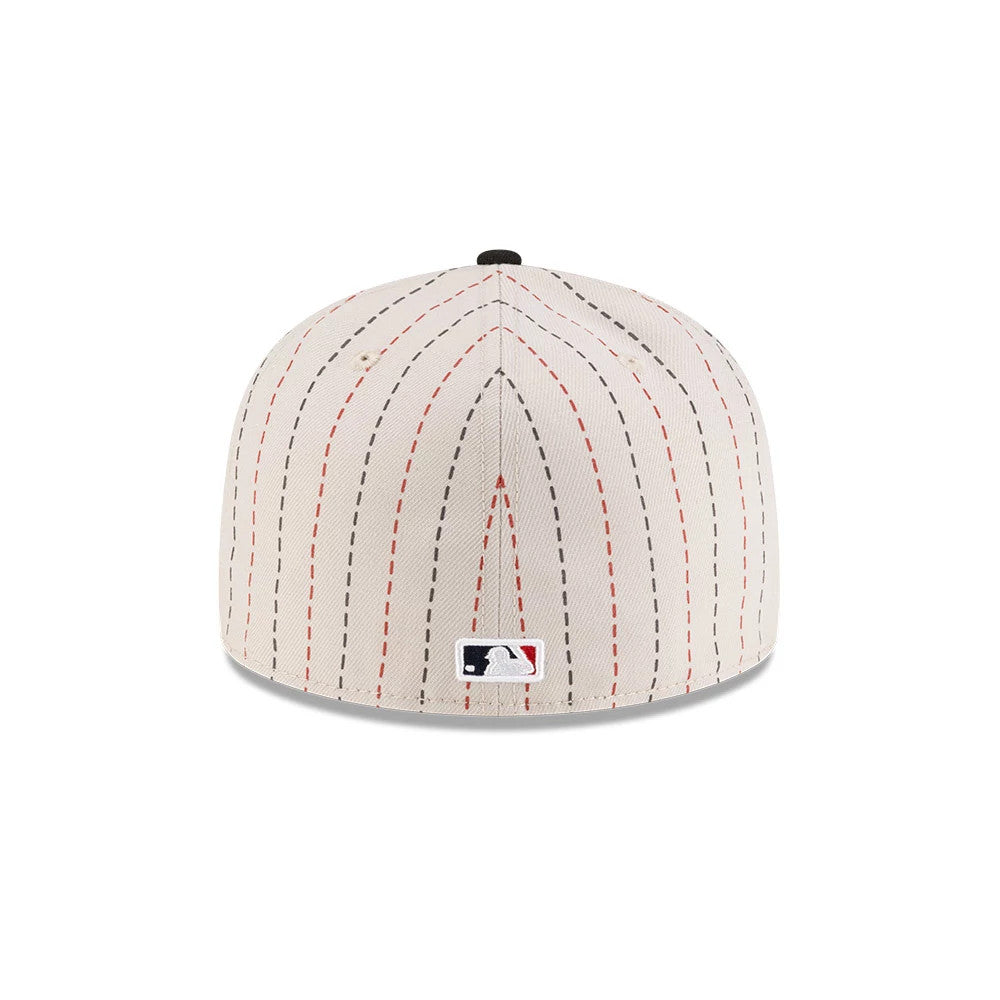 Dueling League MLB Mexico City Series 2026 Light Beige New Era 59FIFTY Fitted Cap, rear view showing the MLB Batterman logo at the centre back, with vertical red and black pinstripes on the light beige crown and a matching top button.