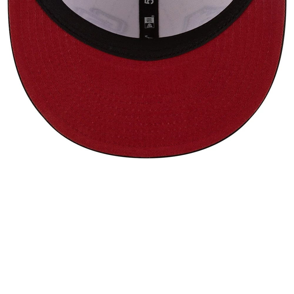 Dueling League MLB Mexico City Series 2026 Light Beige New Era 59FIFTY Fitted Cap, inside view showing the red undervisor, black interior taping with New Era branding, and contrasting black sweatband along the edge.