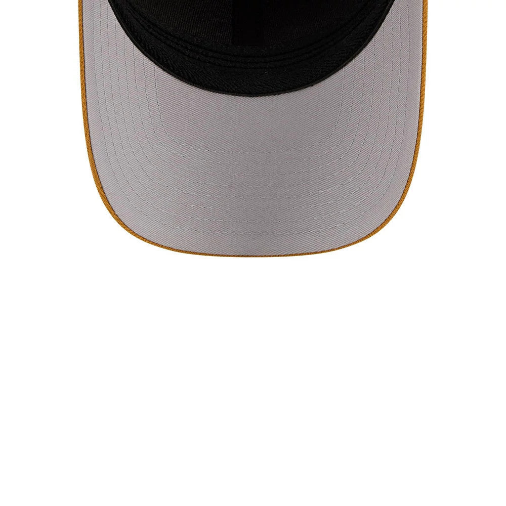 New Era Flag Gold 39THIRTY M-Crown Stretch Fit Cap, inside view showing the contrasting grey undervisor against the black sweatband, fine stitching detail around the edges, and distinct gold rim accentuating the visor edge.