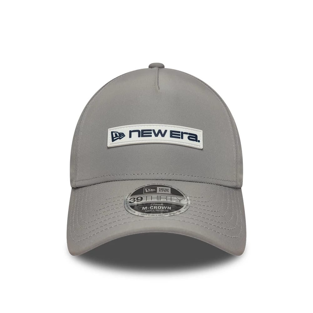 Pictured is this New Era Rubber Patch 39THIRTY M-Crown A-Frame Stretch Fit cap in grey. 2