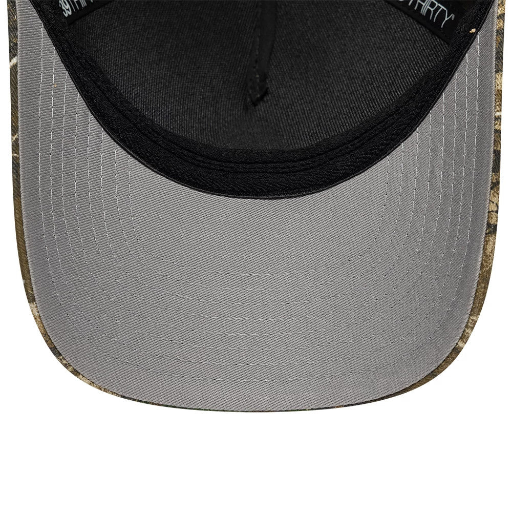 New Era Realtree Edge Camo 39THIRTY M-Crown A-Frame Stretch Fit Cap, inside view featuring a grey undervisor, black internal sweatband, and black taping with a pattern matching the camo design of the cap’s visor.