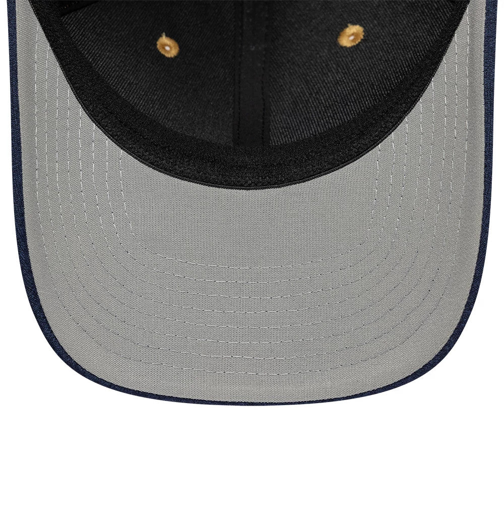 New Era 2 Tone Yellow 39SEVENTY Stretch Fit Cap, inside view showing the grey undervisor with contrasting stitching, a black sweatband lining the edge, and gold eyelets against the black inner panels of the structured crown.