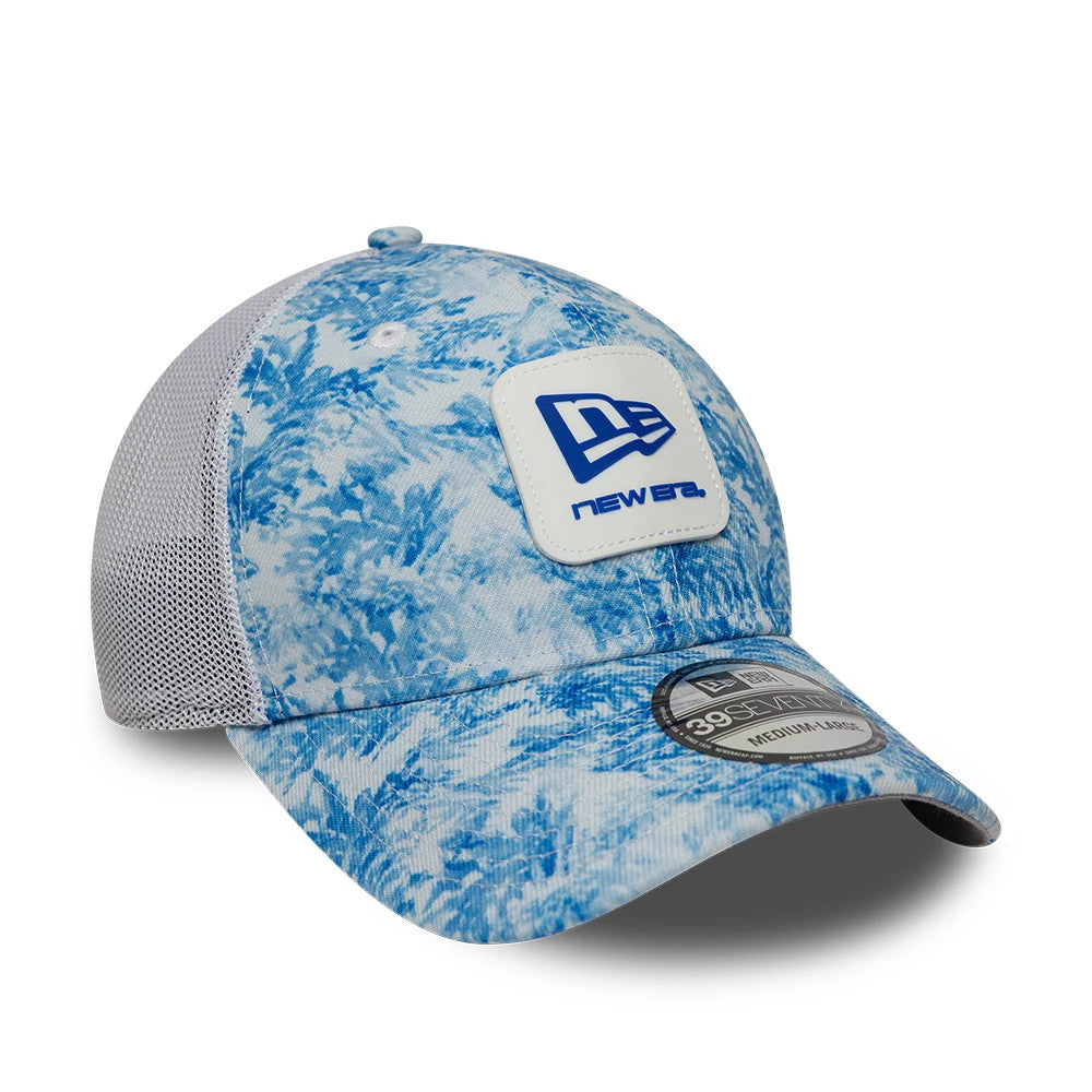 New Era Floral Blue 39SEVENTY Stretch Fit Cap, three-quarter view showing a blue embroidered New Era logo on a front white patch, featuring a blue floral pattern on the structured front panels.