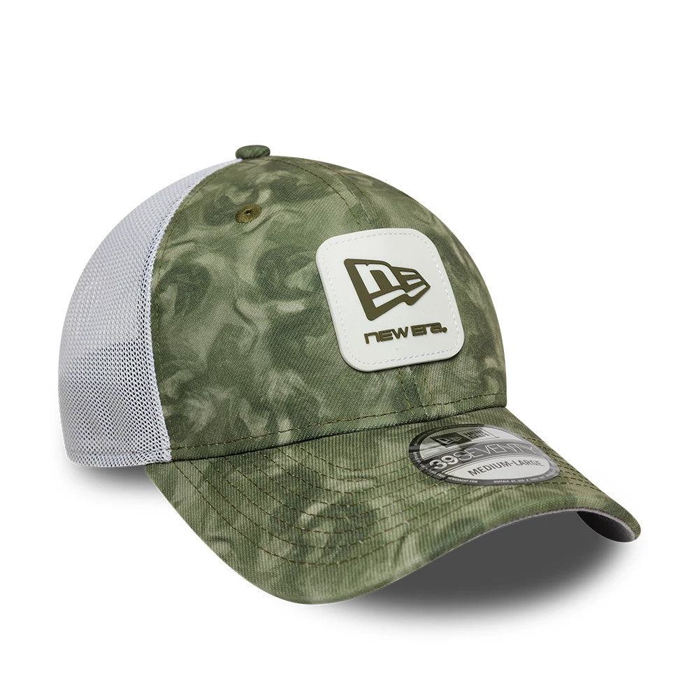 New Era Floral Green 39SEVENTY Stretch Fit Cap, three-quarter view showing the olive New Era patch on the front panel, white mesh back panels, and the grey 39SEVENTY size sticker on the curved green visor.