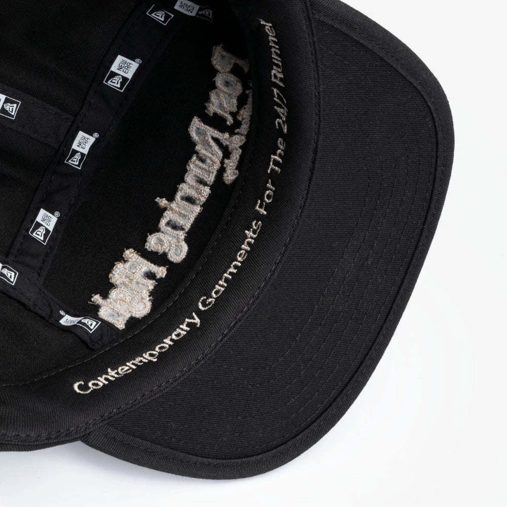 Pictured is this New Era X Hermanos Koumori Running Camper cap in black. 6