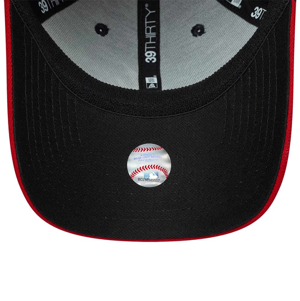 Atlanta Braves MLB Classic Navy New Era 39THIRTY Stretch Fit Cap, inside view showing the grey sweatband and black taping with the 39THIRTY logo, and a prominent round holographic sticker on the black undervisor.