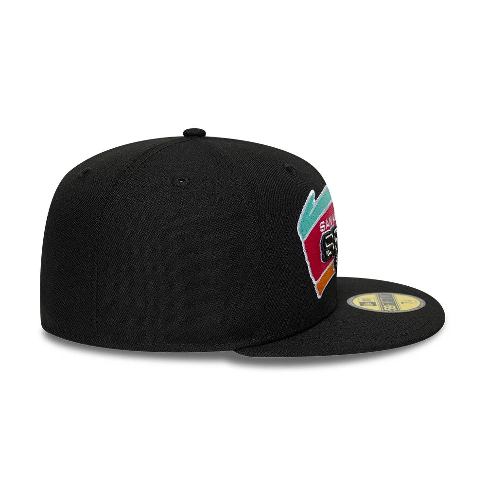 San Antonio Spurs NBA Hardwood Classic Black New Era 59FIFTY Fitted Cap, side view showing the multicoloured embroidered Spurs logo on the front panel, clean black visor with a gold 59FIFTY size sticker, and structured black crown with eyelets.