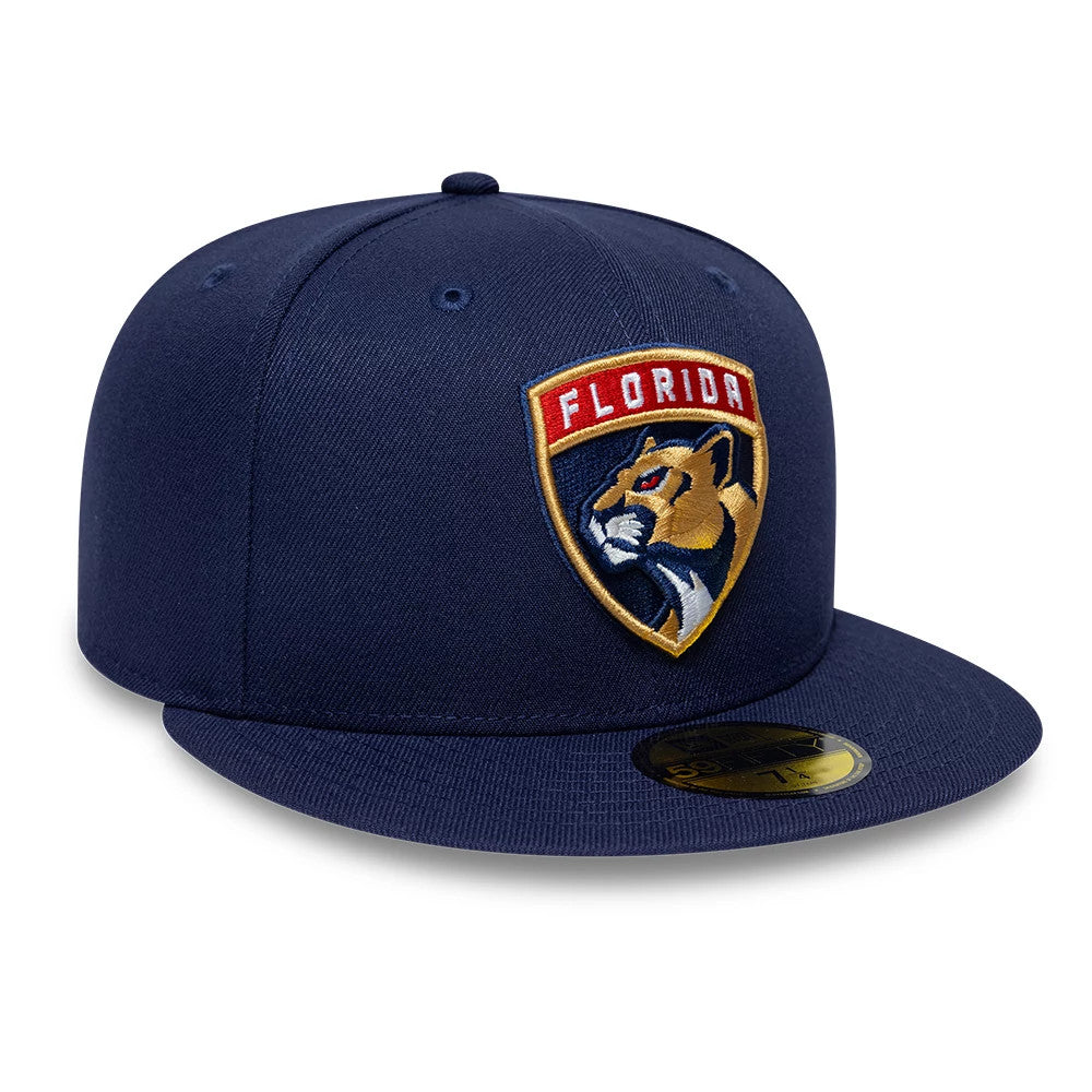 Florida Panthers NHL Navy New Era 59FIFTY Fitted Cap, three-quarter view showing the raised embroidered team logo on the front panel, a flat navy visor with a gold 59FIFTY size sticker, and a matching top button.