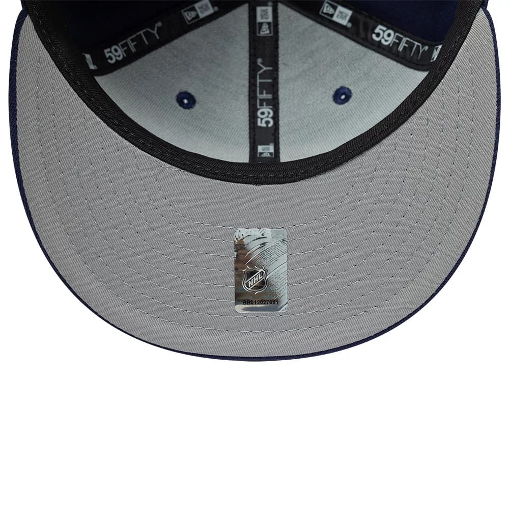 Pictured is this NHL Classic Florida Panthers 59FIFTY Fitted cap in navy. 2