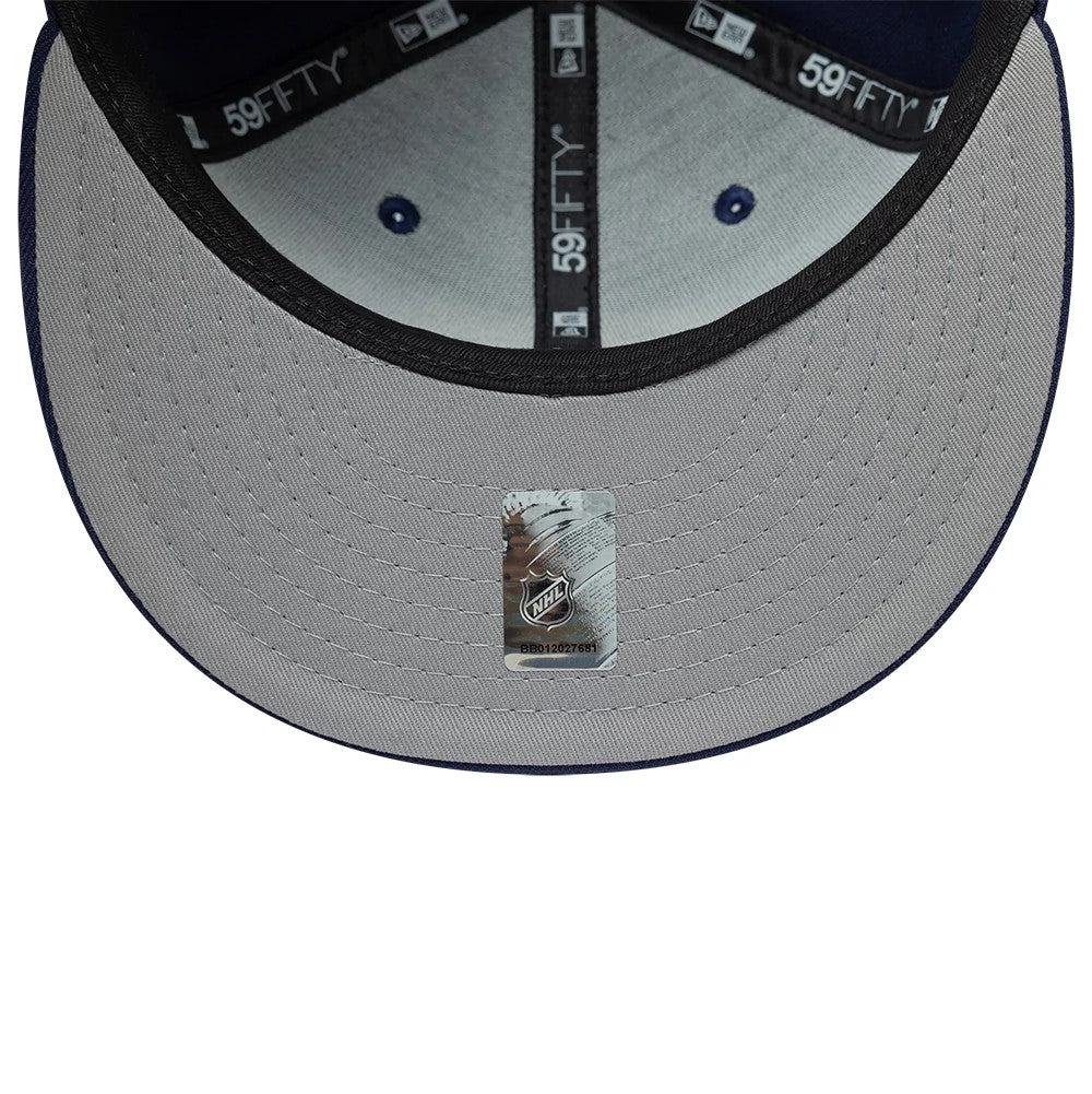 Florida Panthers NHL Navy New Era 59FIFTY Fitted Cap, inside view showing the dark grey undervisor with a NHL sticker at the centre, black 59FIFTY taping across each seam, and a black sweatband lining the crown.