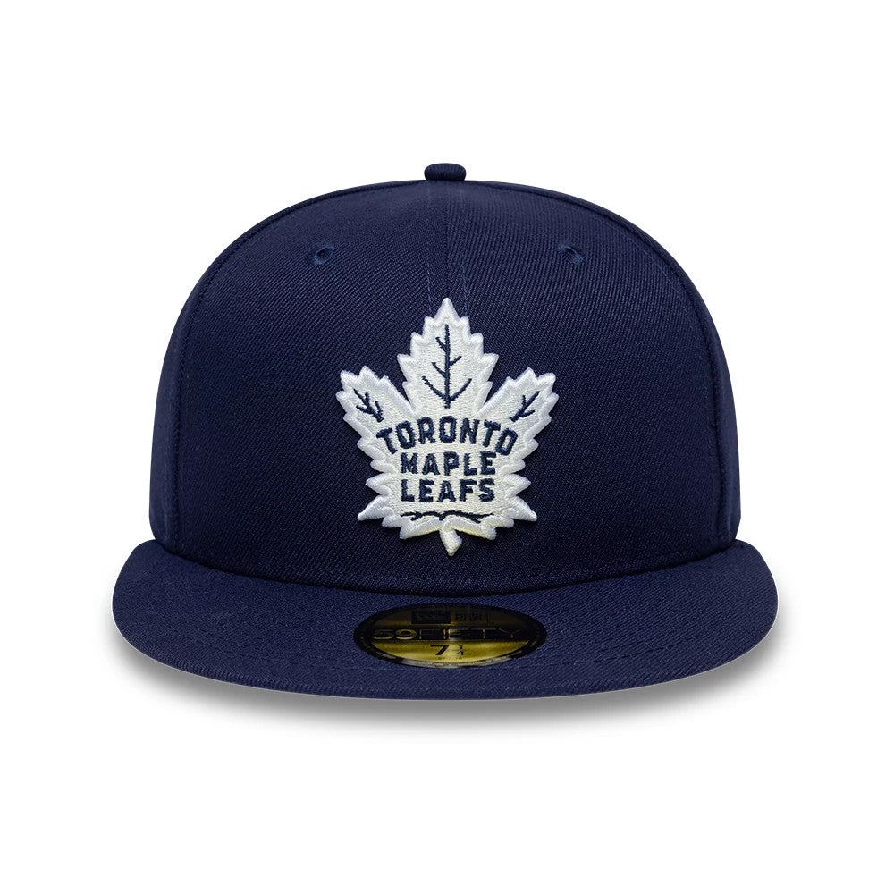 Toronto Maple Leafs NHL Basic Navy New Era 59FIFTY Fitted Cap, front view showing the raised white embroidered team logo on the front panel, complemented by a flat navy visor and a gold 59FIFTY size sticker on the top.