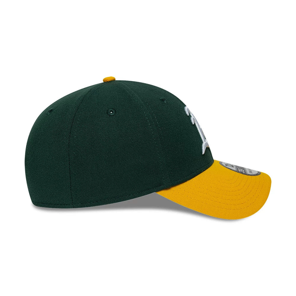 Athletics MLB Classic Dark Green New Era 39THIRTY Stretch Fit Cap, side view showing the white embroidered Athletics logo on the front panel, with a dark green structured crown, contrasting gold visor, and eyelets matching the crown colour.