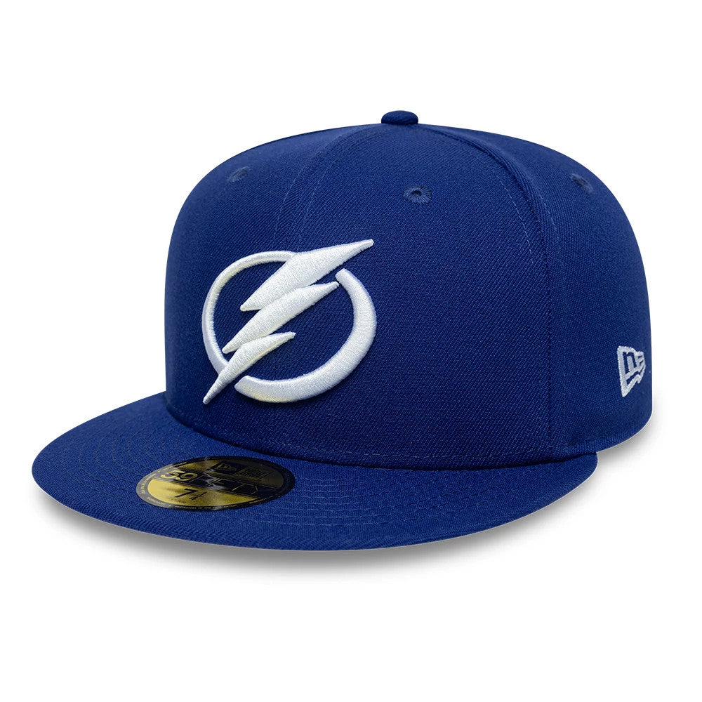 Tampa Bay Lightning NHL Basic Dark Blue New Era 59FIFTY Fitted Cap, three-quarter view showing the raised white embroidered Lightning logo on the front panel, featuring a matching dark blue visor with a gold 59FIFTY size sticker.