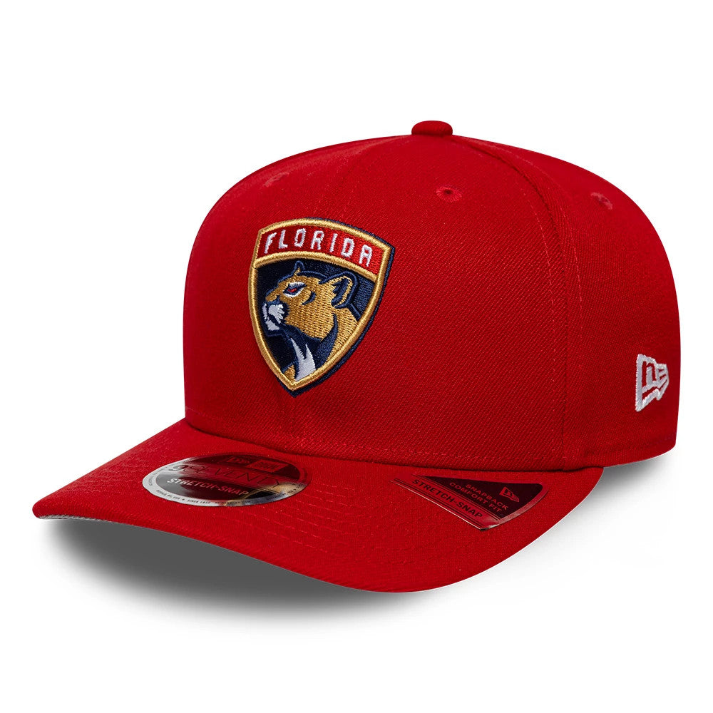 Florida Panthers NHL Team Red New Era 9SEVENTY Stretch Snap Adjustable Cap, front view showing the raised embroidered team logo patch on the structured red crown, with a curved visor featuring a 9SEVENTY size sticker.