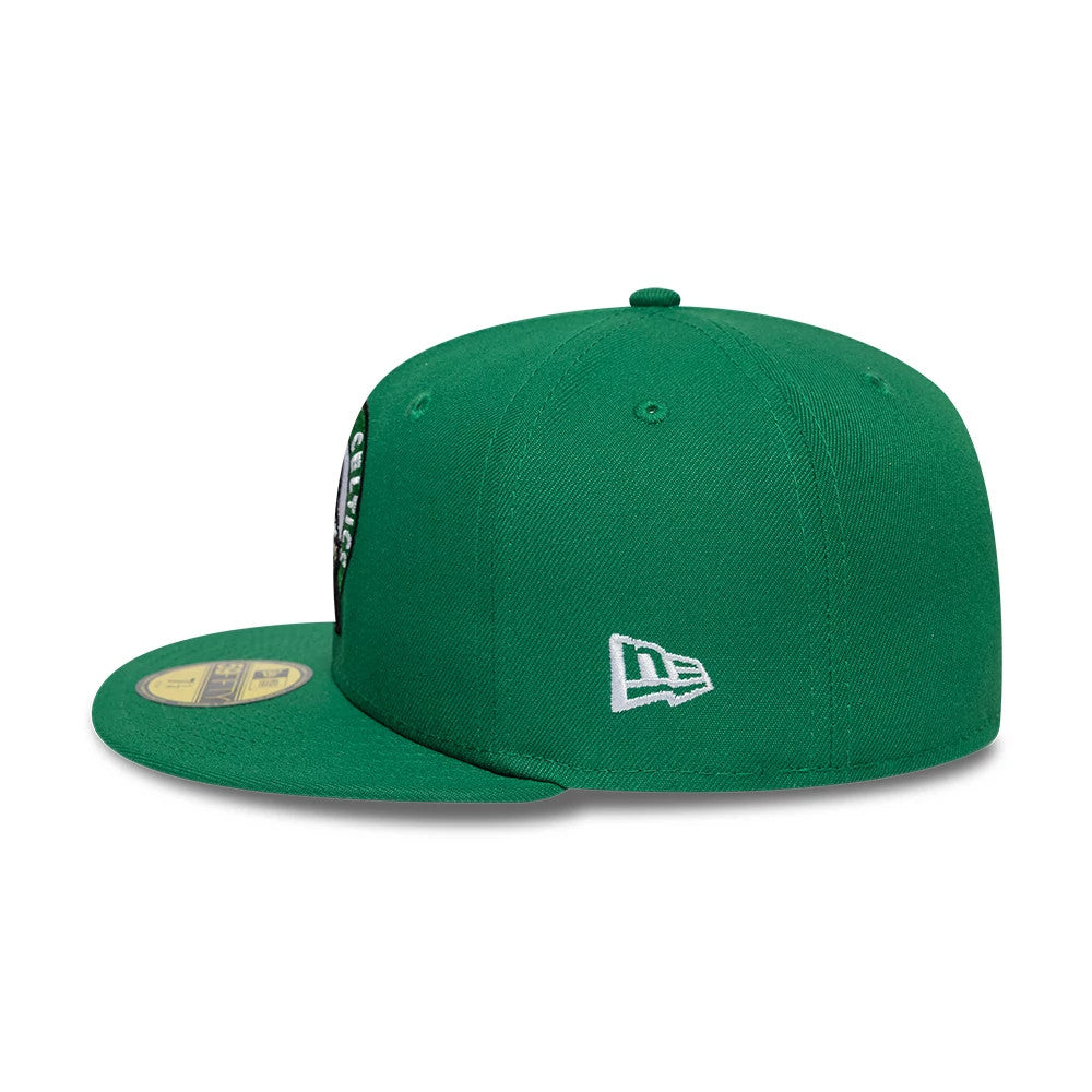 Boston Celtics NBA Basic Green New Era 59FIFTY Fitted Cap, side view showing the white embroidered New Era flag logo on the left side, a structured green crown with matching top button and eyelets.