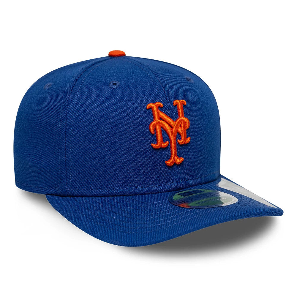 New York Mets MLB Player Replica Blue New Era 9SEVENTY Stretch Snap Adjustable Cap, front view showing the raised orange NY logo on the structured blue crown, with a curved blue visor and a 9SEVENTY size sticker on the edge of the visor.