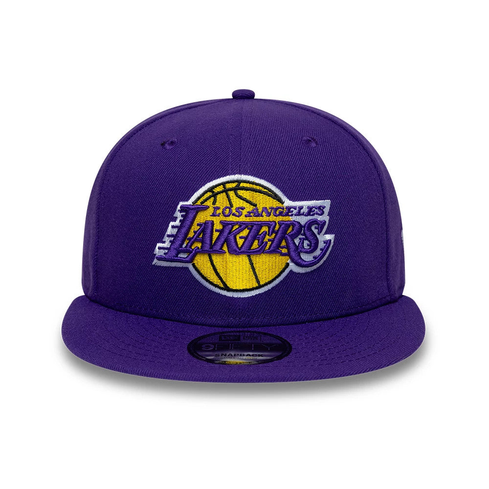 LA Lakers NBA Purple New Era 9FIFTY Snapback Adjustable Cap, front view showing a prominent yellow basketball with purple embroidered Lakers logo on the front panel, matched with a flat purple visor and a 9FIFTY size sticker.