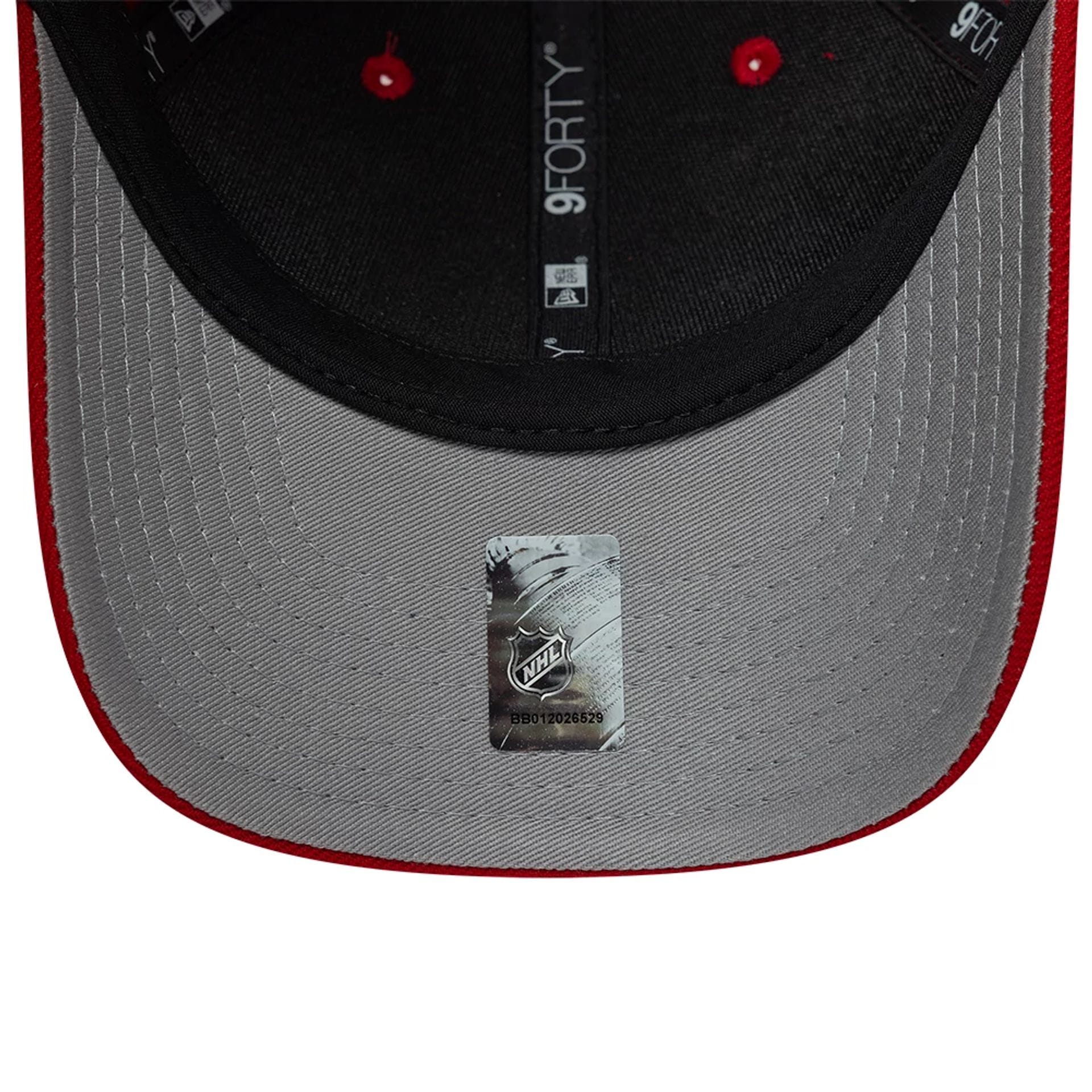 Pictured is this NHL Team Chicago Blackhawks 9FORTY M-Crown cap in red. 2