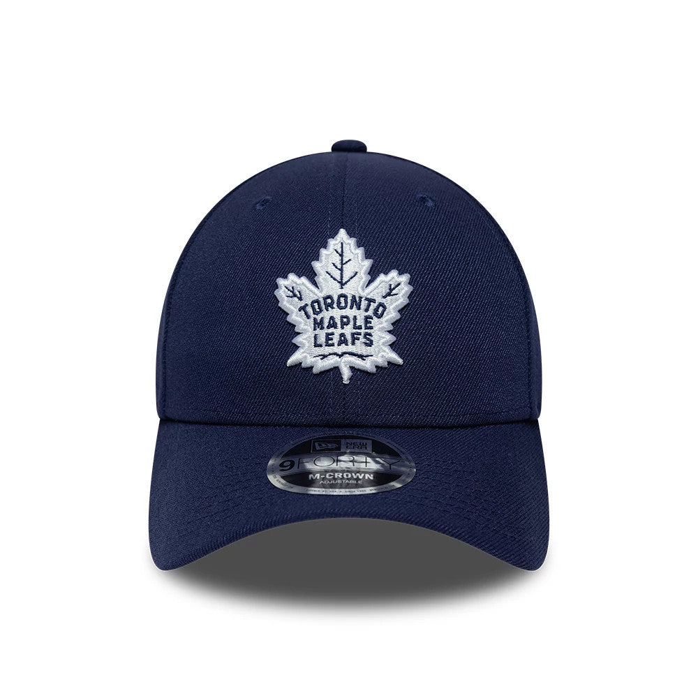Toronto Maple Leafs NHL Team Navy New Era 9FORTY M-Crown Adjustable Cap, front view showing a raised white embroidered team logo on the structured navy crown, with a curved visor and 9FORTY size sticker centred below the logo.