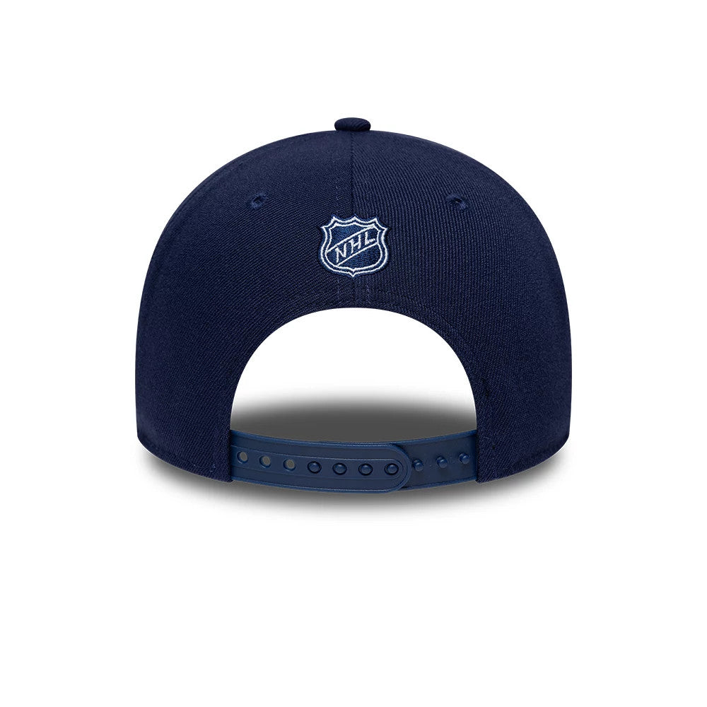 Toronto Maple Leafs NHL Team Navy New Era 9FORTY M-Crown Adjustable Cap, rear view showing the white embroidered NHL shield logo at the centre back, with a navy adjustable strap and matching navy eyelets on the structured crown.