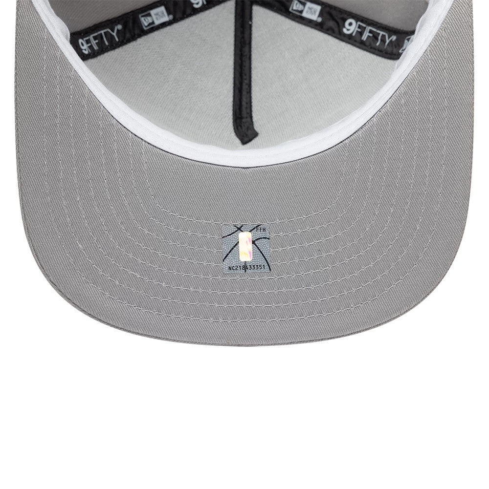 San Antonio Spurs NBA Hardwood Classic Grey New Era 9FIFTY A-Frame Snapback Adjustable Cap, inside view showing the grey undervisor with a holographic sticker, black taping with white text, and a contrasting white sweatband lining.