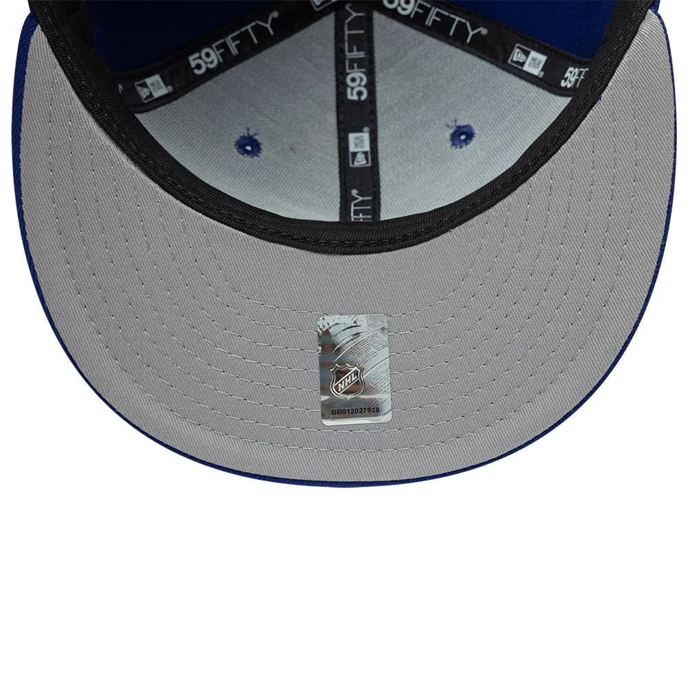 Pictured is this NHL Basic New York Rangers 59FIFTY Fitted cap in blue. 2