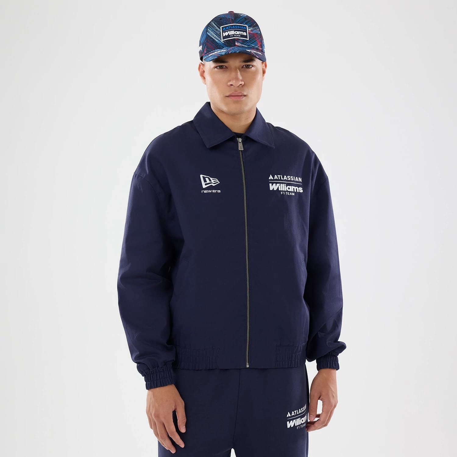 The model is wearing this Williams GB Race Special Collared Jacket in navy. 1