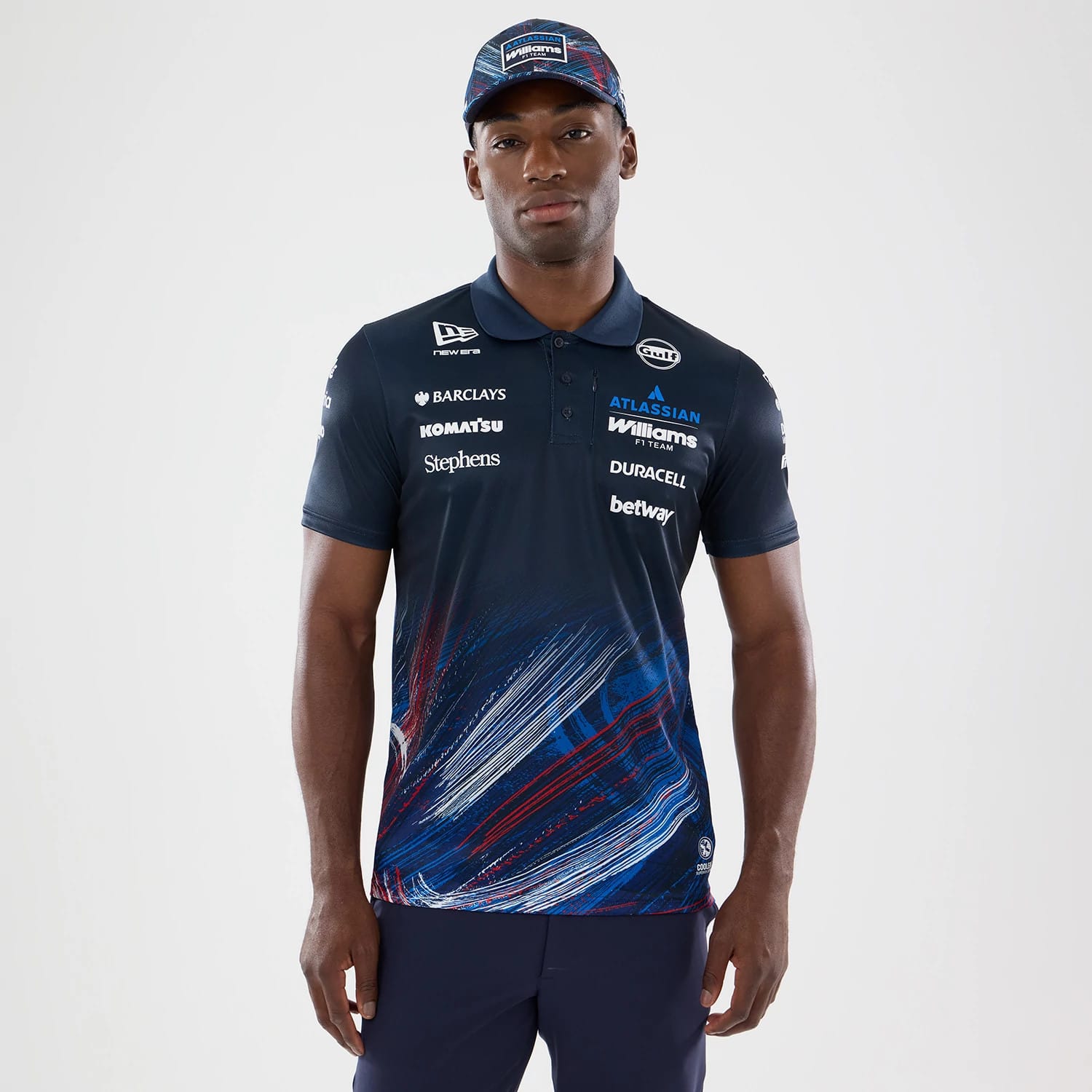 The model is wearing this Williams GB Race Special Tech Polo T-Shirt in navy. 1