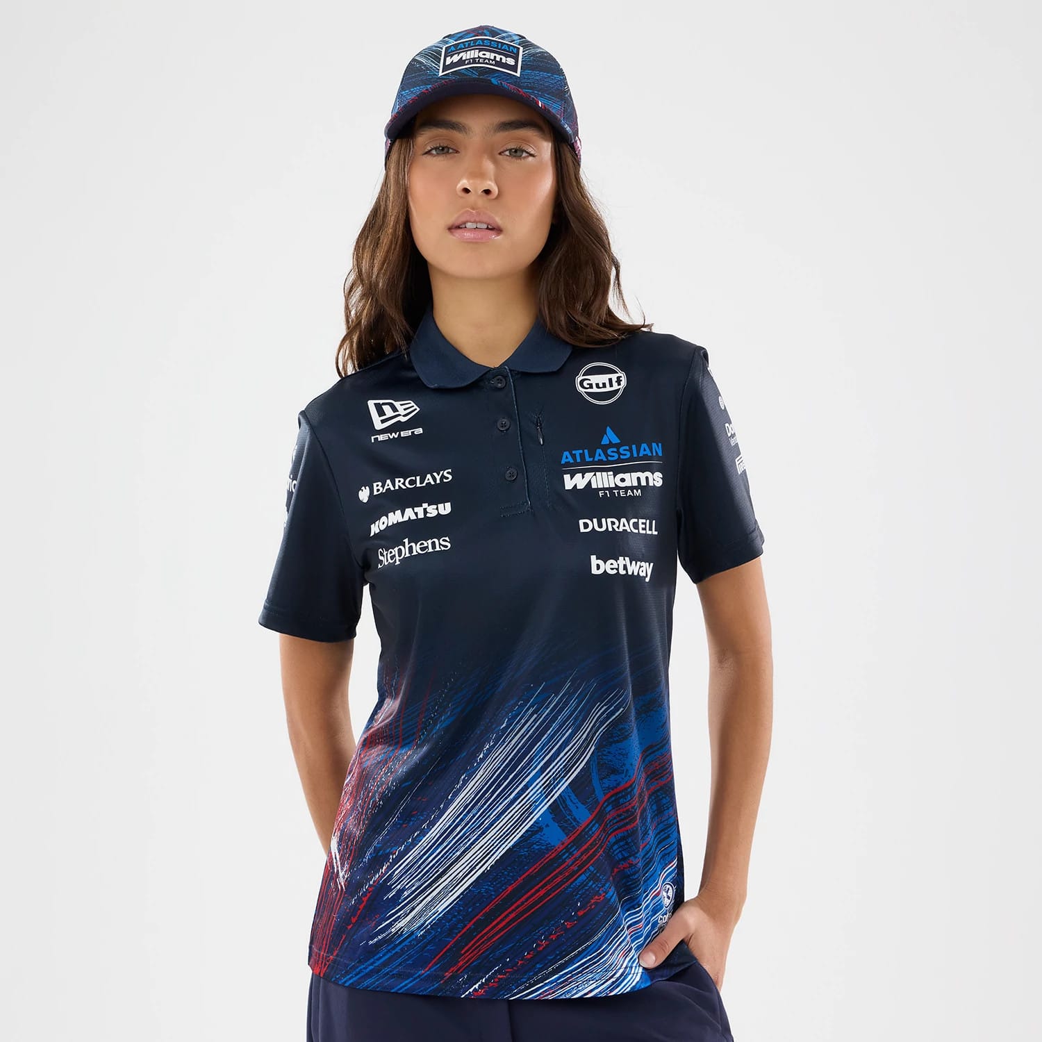 The model is wearing this Womens Williams GB Race Special Tech Polo T-Shirt in navy. 1