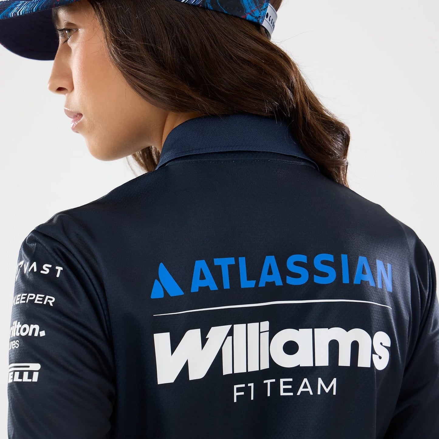 The model is wearing this Womens Williams GB Race Special Tech Polo T-Shirt in navy. 7