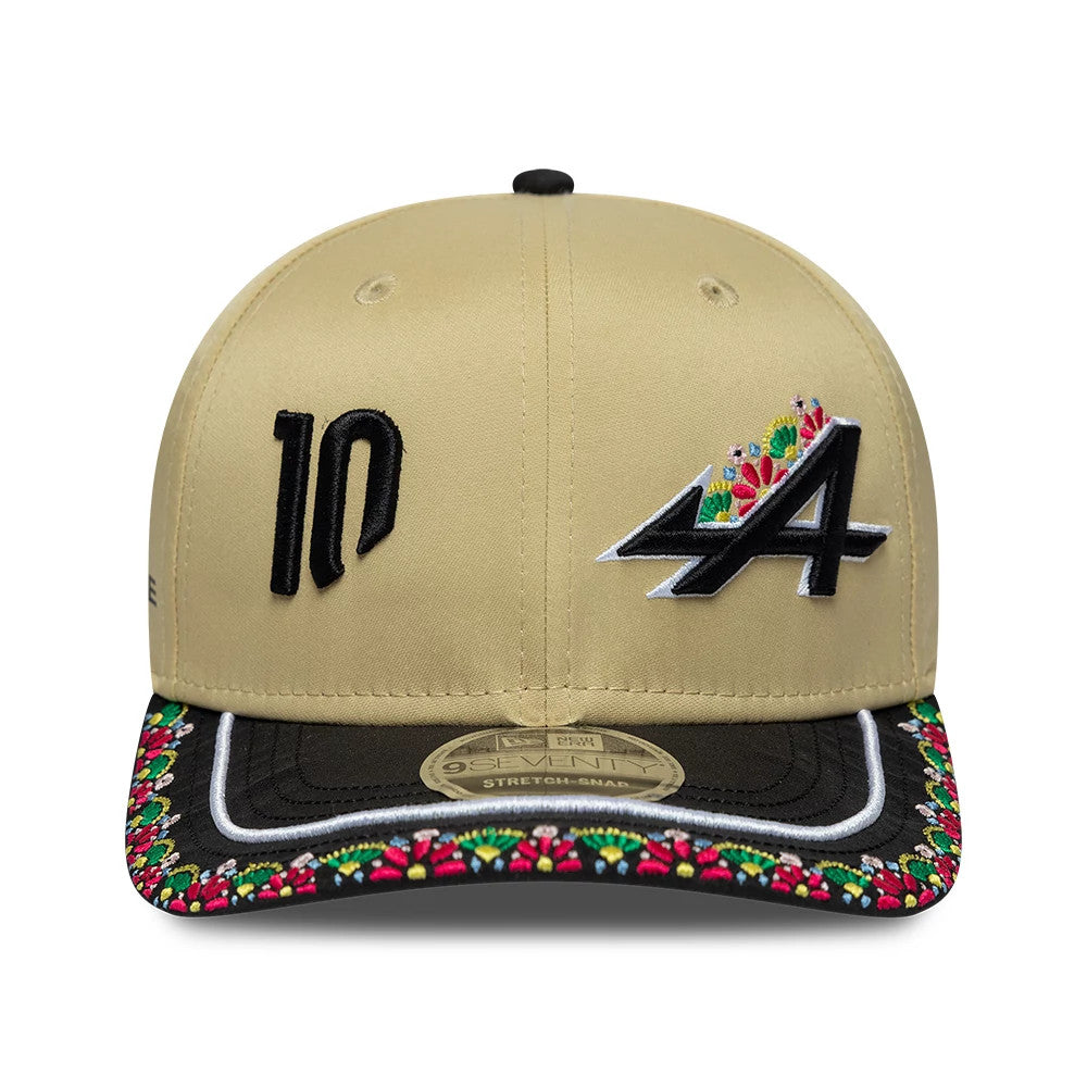 Alpine Racing Latin American Pierre Gasly Light Beige New Era 9SEVENTY Stretch Snap Adjustable Cap, front view showing an embroidered black '10' on the left front panel, the A logo with colourful floral accents.