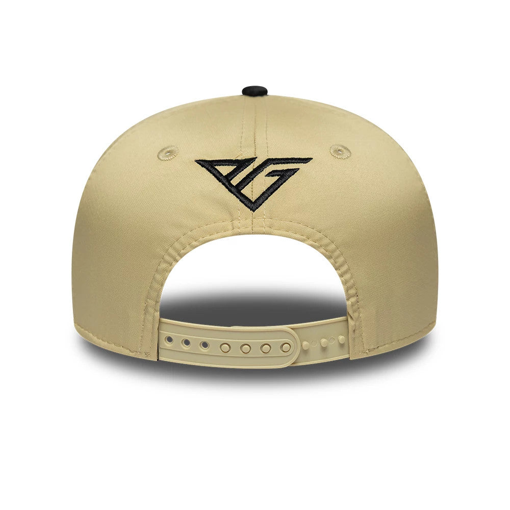 Alpine Racing Latin American Pierre Gasly Light Beige New Era 9SEVENTY Stretch Snap Adjustable Cap, rear view showing the black embroidered PG logo centred on the light beige back panels, with an adjustable beige snap closure below.