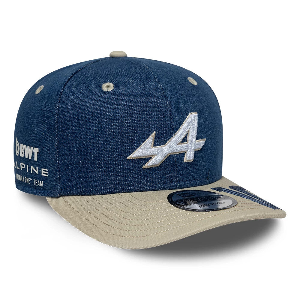 Alpine Racing Austin Race Special Pierre Gasly Navy New Era 9SEVENTY Stretch Snap Adjustable Cap, three-quarter view showing the raised embroidered white A logo on the front panel, with a beige curved visor and 9SEVENTY size sticker.