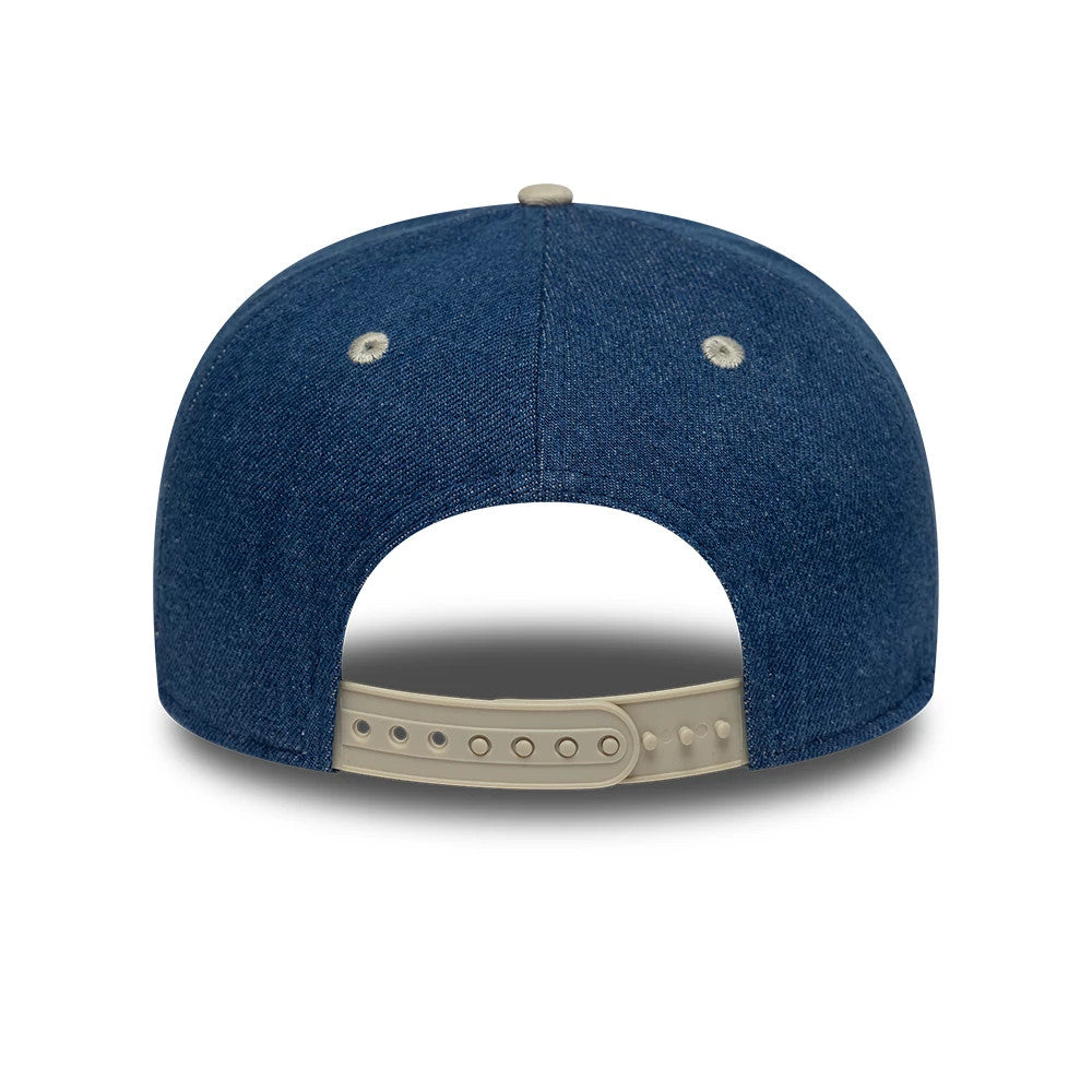 Alpine Racing Austin Race Special Franco Colapinto Navy New Era 9SEVENTY Stretch Snap Adjustable Cap, rear view showing the navy blue fabric with beige eyelets and top button, adjustable beige strap with multiple holes for custom fitting.