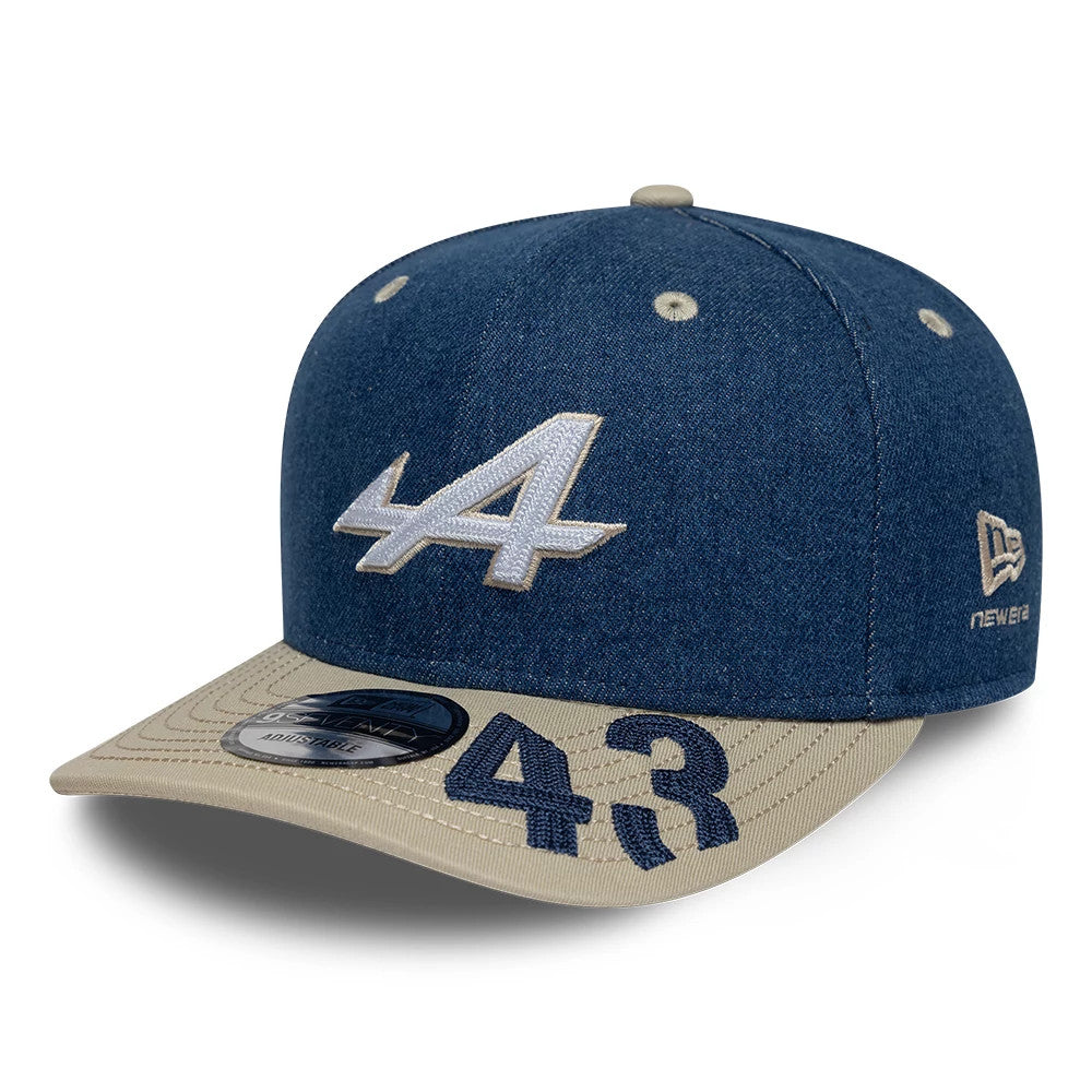 Alpine Racing Austin Race Special Franco Colapinto Navy New Era 9SEVENTY Stretch Snap Adjustable Cap, front view showing the raised white A logo embroidered on the centre of the navy crown, beige visor with navy 43, and 9SEVENTY size sticker.
